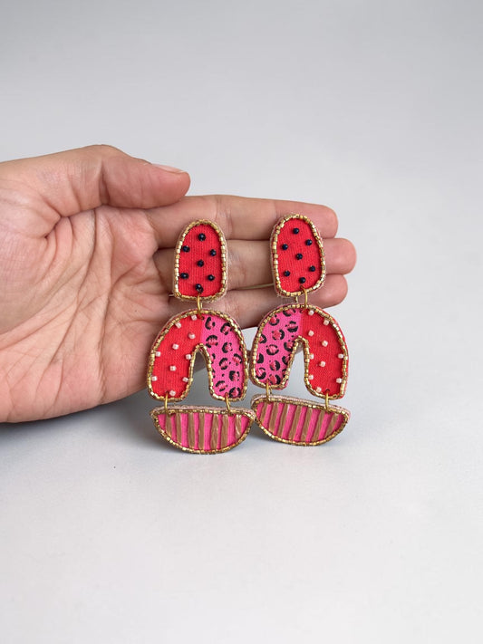 Aros pintados y bordados a mano